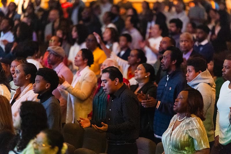 Congregation standing in worship