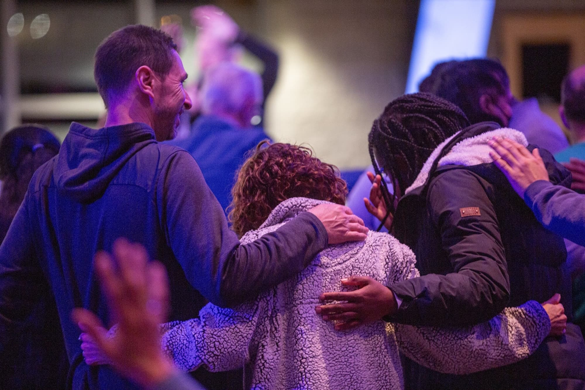 People embracing at GKM Church