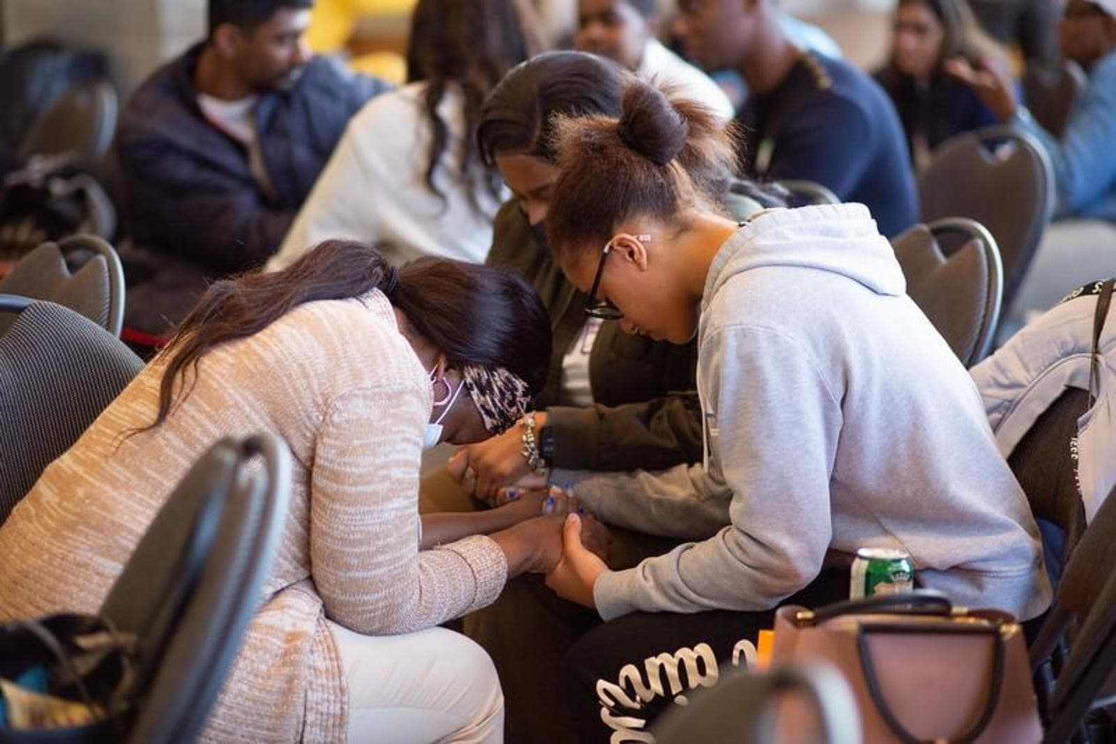 Women praying together